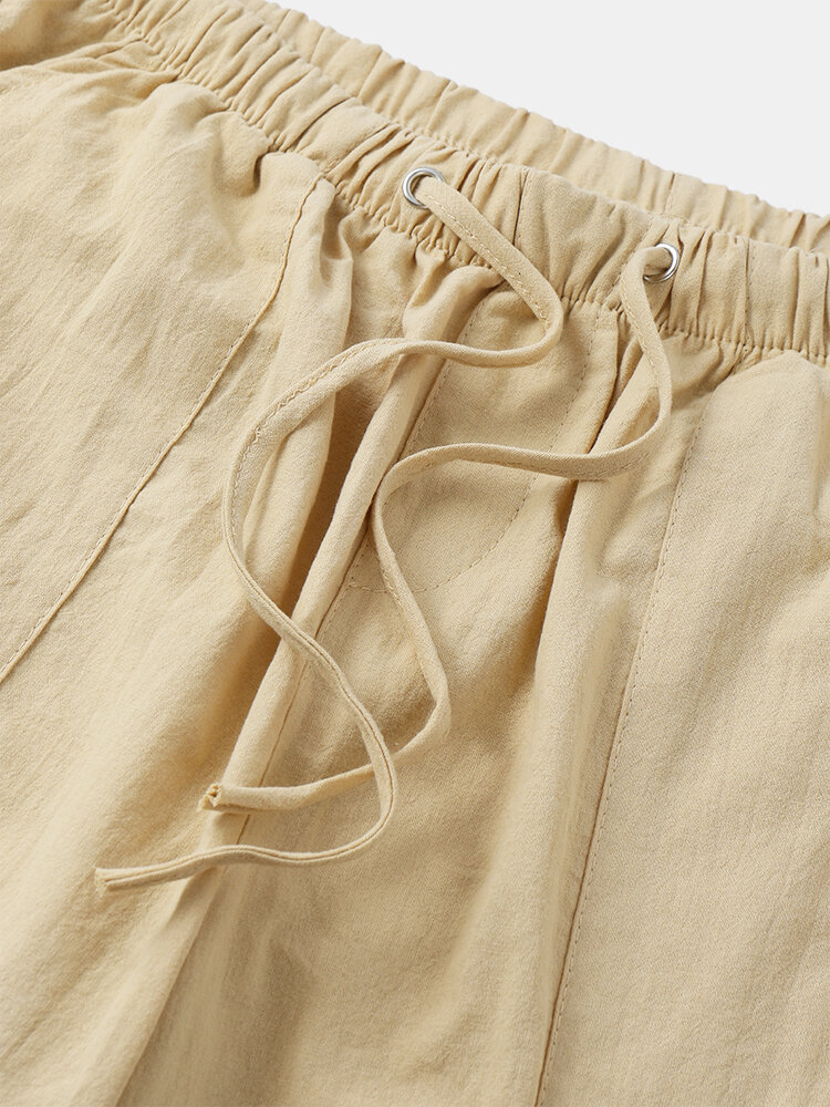 
	Men Solid Color Drawstring Pocket Casual Loose Straight Pants