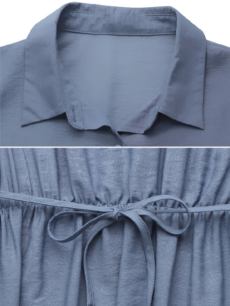 
	Ethnic Solid Color Pocket Button Long Sleeve Lapel Maxi Dress